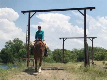 Ashley Hartzog riding horse